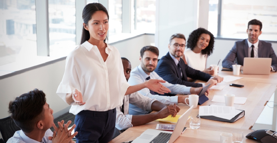 A group of people having a meeting in an office setting
