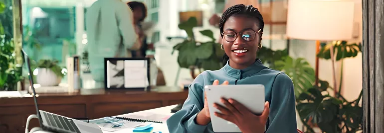 A professional employer smiling when seeing the results of vertical and horizontal career growth strategy implementation.