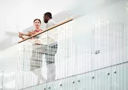 2 people working together