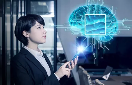 Woman interacting with a digital brain hologram.